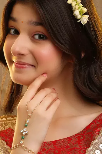 Gold plated kundan green stones haath phool