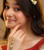 Gold plated kundan green stones haath phool