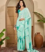 Women's sea green crepe printed saree with unstitched blouse piece