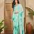 Women's sea green crepe printed saree with unstitched blouse piece