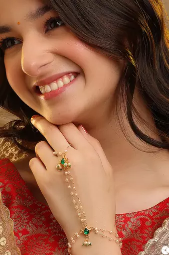 Gold plated kundan green stones haath phool