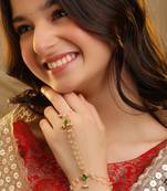 Gold plated kundan green stones haath phool