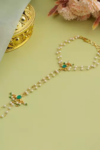 Gold plated kundan green stones haath phool