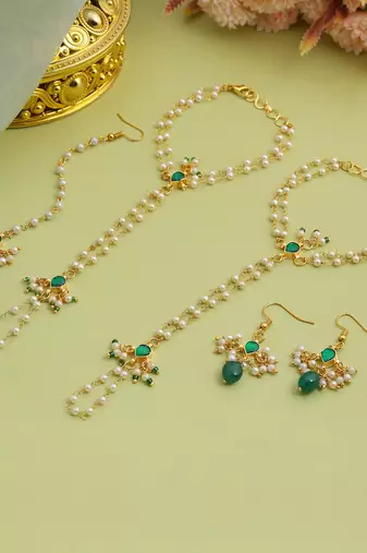 Gold plated kundan green stones earrings