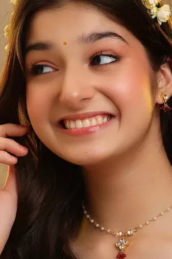 Gold plated kundan maroon stones necklace set