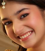 Gold plated kundan green stones maang tikka