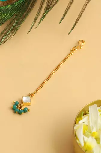Gold plated kundan green stones maang tikka
