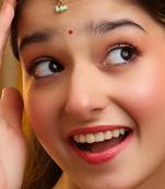 Gold plated kundan green stones maang tikka