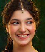 Gold plated kundan green stones maang tikka