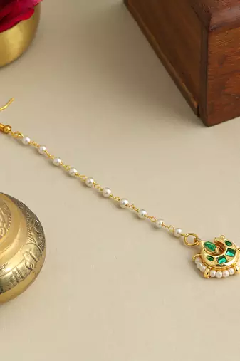 Gold plated kundan green stones maang tikka