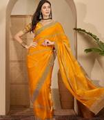 women's orange silk blend chiffon embellished saree with unstitched blouse piece