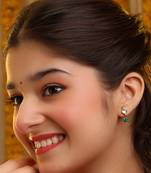 Gold plated kundan green stones earrings