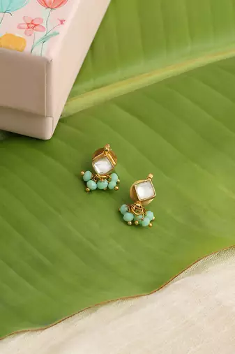 Gold plated kundan green stones earrings
