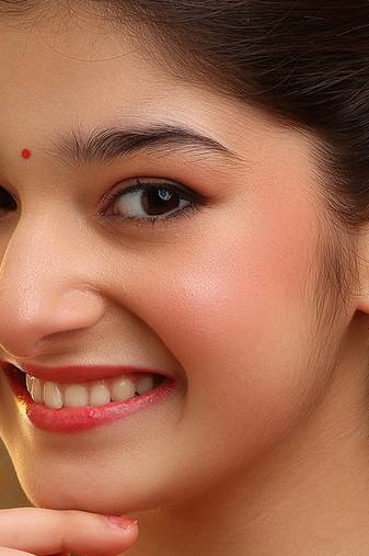 Gold plated kundan orange stones earrings