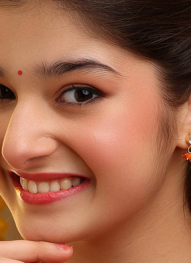 Gold plated kundan orange stones earrings