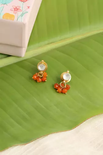 Gold plated kundan orange stones earrings
