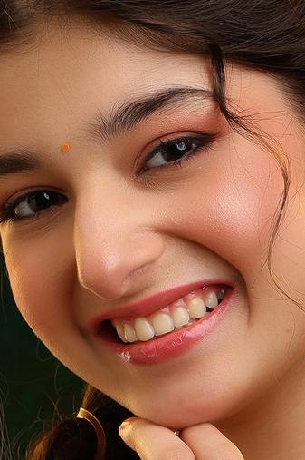 Gold plated kundan green stones earrings