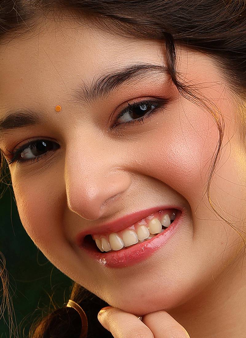 Gold plated kundan green stones earrings