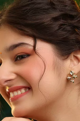 Gold plated kundan green stones earrings