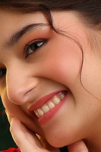 Gold plated kundan green stones earrings