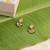 Gold plated kundan green stones earrings
