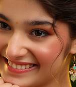 Gold plated kundan green stones earrings