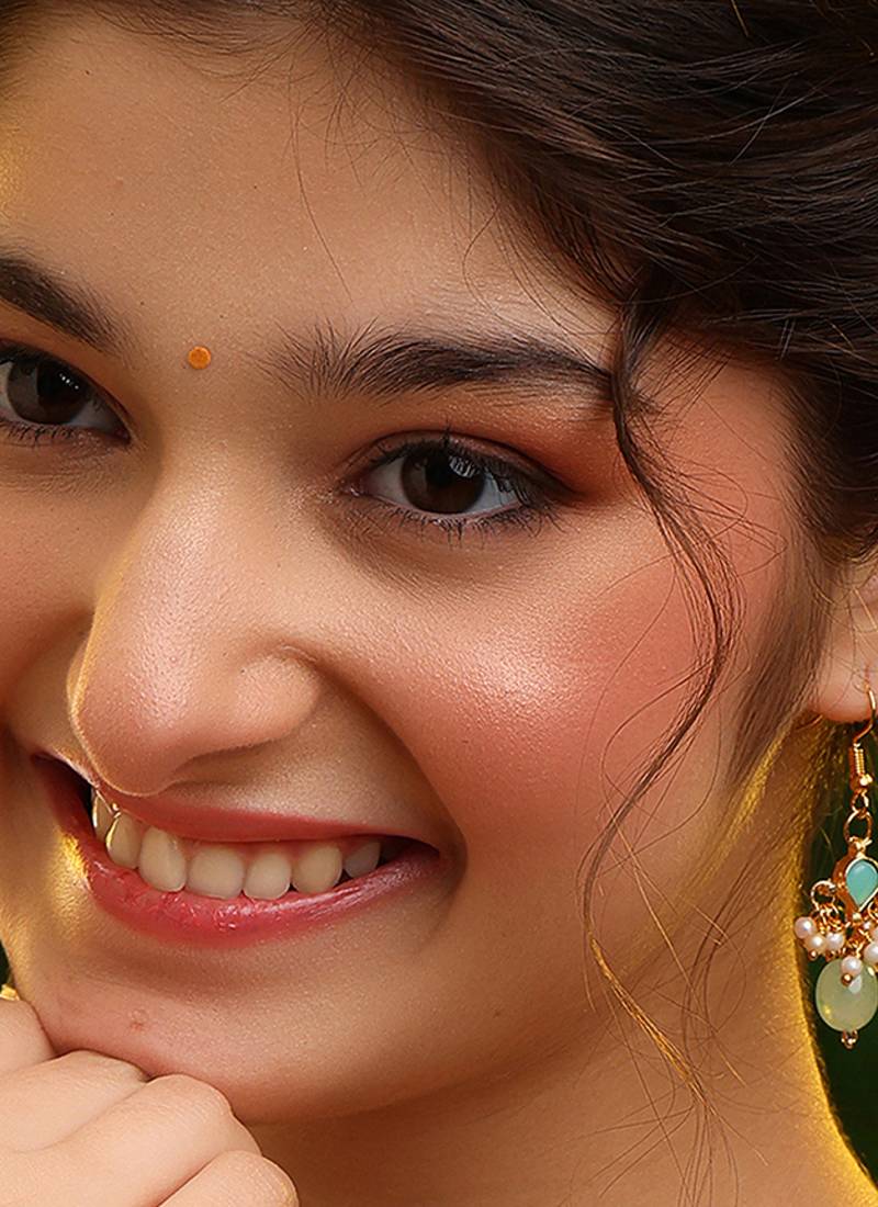 Gold plated kundan green stones earrings