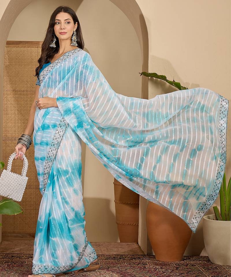 Women's sky blue chiffon embellished saree with unstitched blouse piece