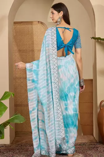 Women's sky blue chiffon embellished saree with unstitched blouse piece