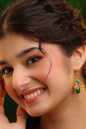 Gold plated kundan green stones earrings