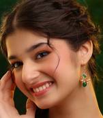 Gold plated kundan green stones earrings