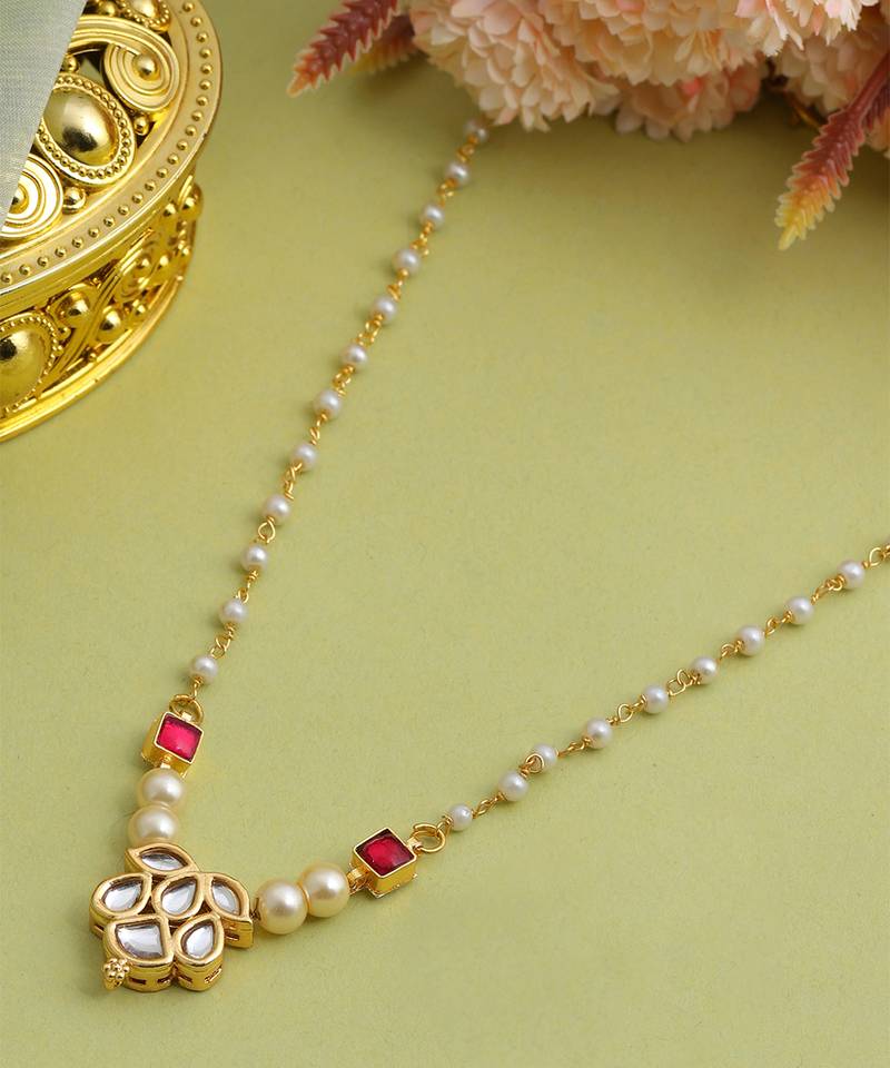 Gold plated kundan maroon stones necklace