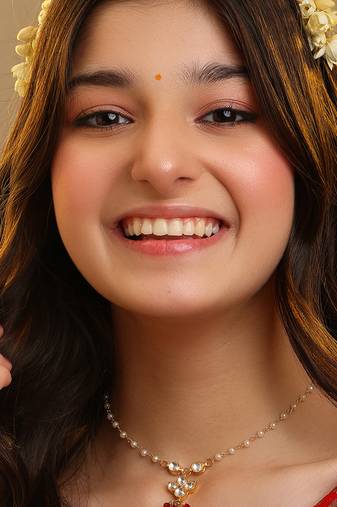 Gold plated kundan maroon stones necklace