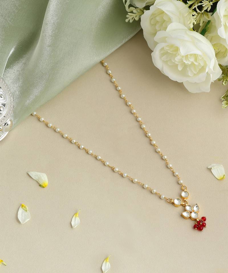 Gold plated kundan maroon stones necklace