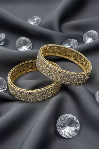 Intricate lattice-work crystal bangles