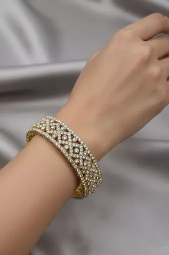 Intricate lattice-work crystal bangles