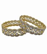 Wave-patterned kundan infinity bangles