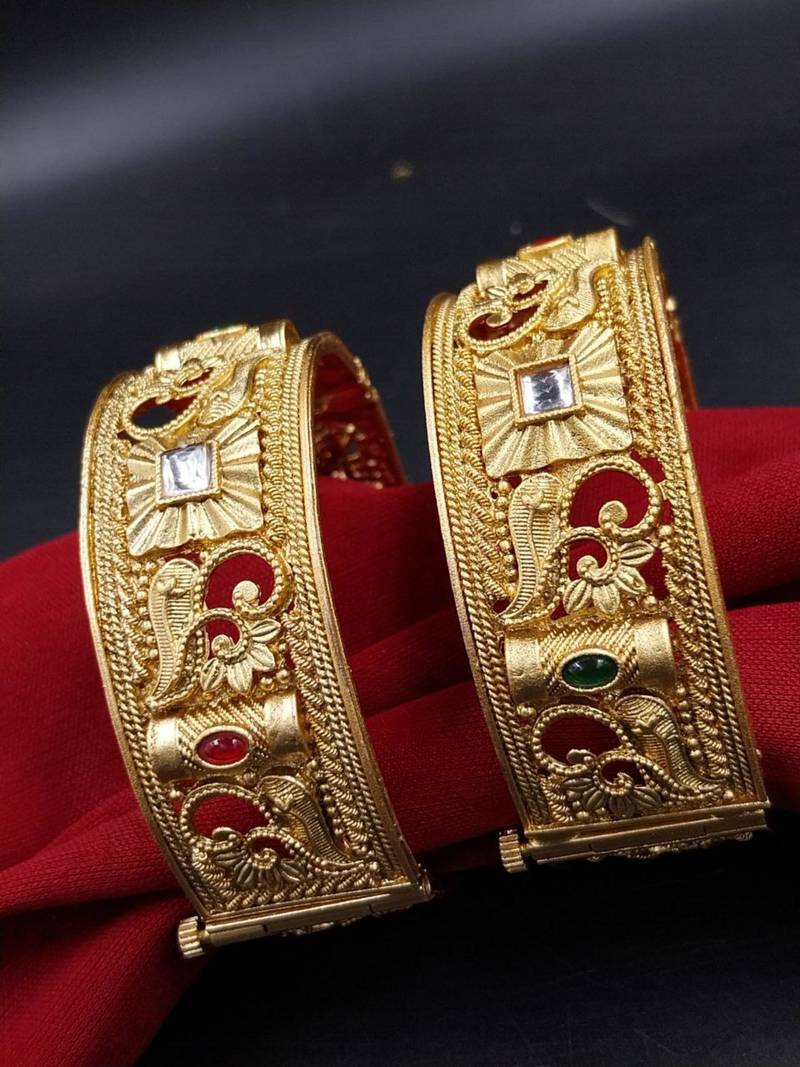 Intricate filigree gold kada set