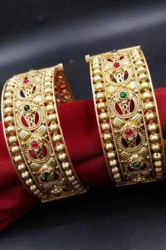 Royal temple work gold bangles