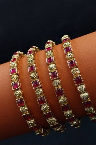 Ruby-set slim gold bangles