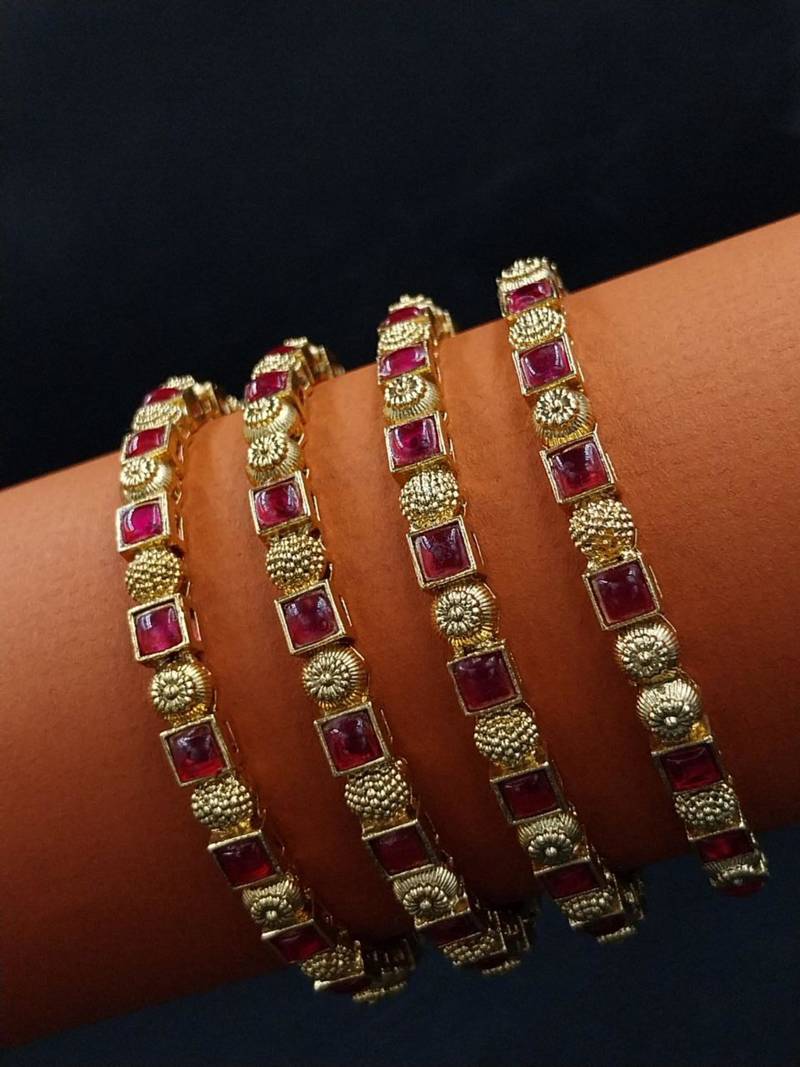 Ruby-set slim gold bangles