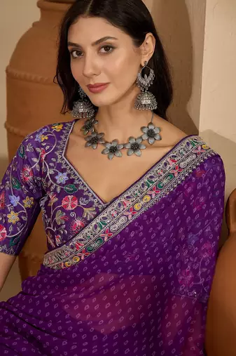 Women's purple georgette bandhni saree with unstitched blouse piece
