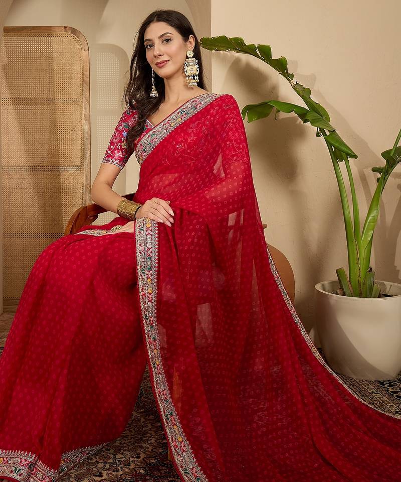 Women's red georgette bandhni saree with unstitched blouse piece