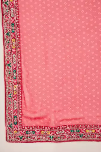 Women's red georgette bandhni saree with unstitched blouse piece