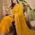 Women's gold georgette bandhni saree with unstitched blouse piece