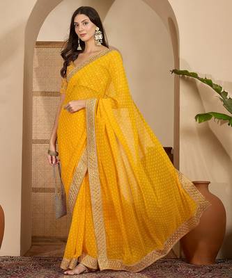 Women's gold georgette bandhni saree with unstitched blouse piece 2