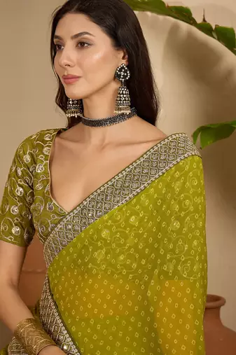 Women's green georgette bandhni saree with unstitched blouse piece
