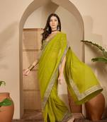 Women's green georgette bandhni saree with unstitched blouse piece