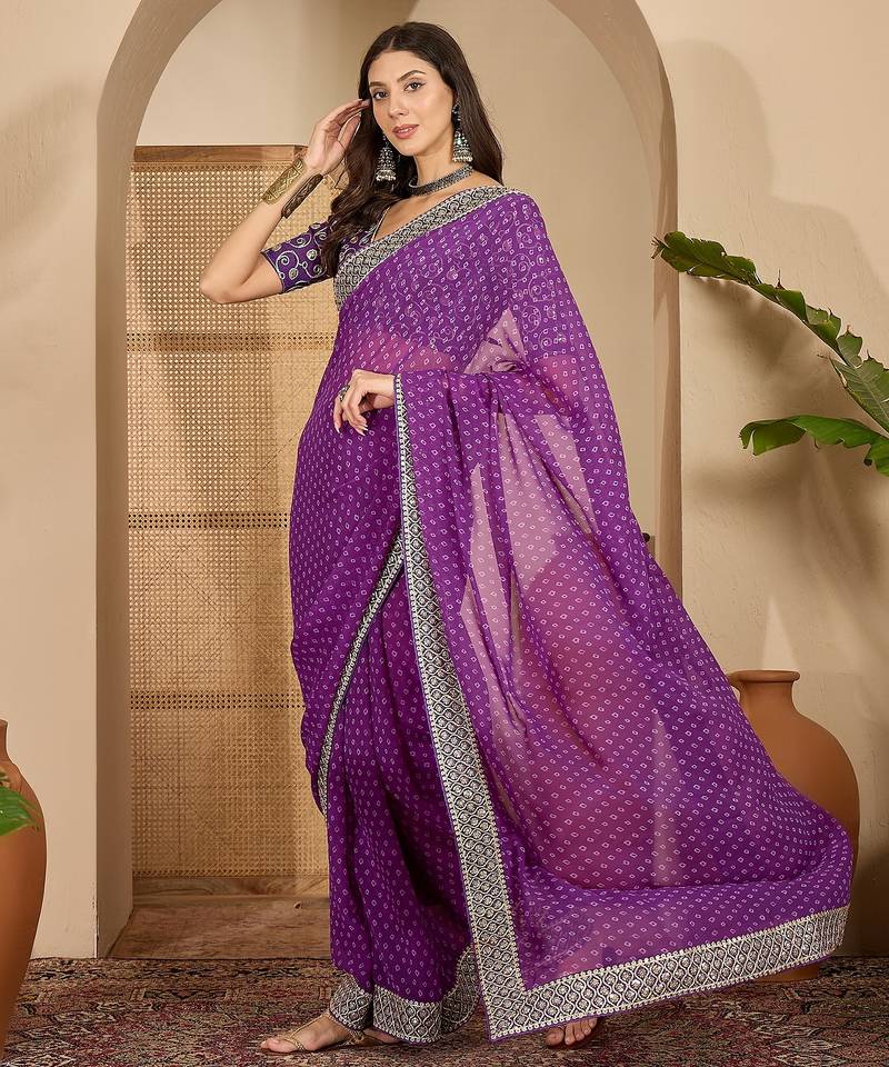 Women's purple georgette bandhni saree with unstitched blouse piece