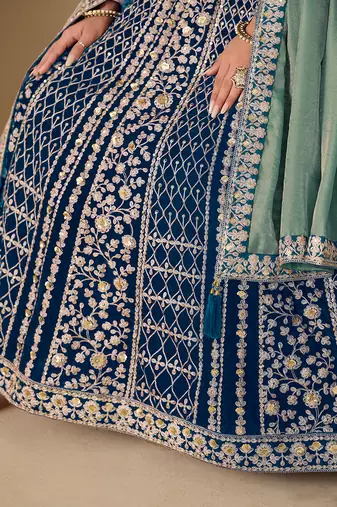 Teal blue embroidered sequence velvet anarkali suit
